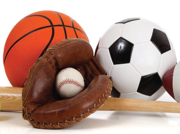 an image of various sports equipment, on a white background, including a basketball, a football, a catcher's mitt and a baseball bat
